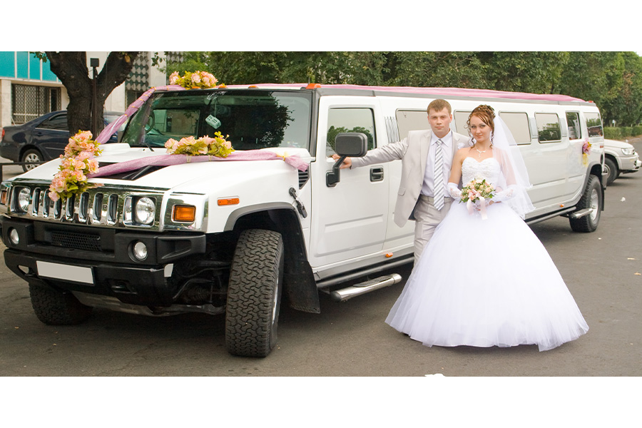 White Hummer Limmo Couple